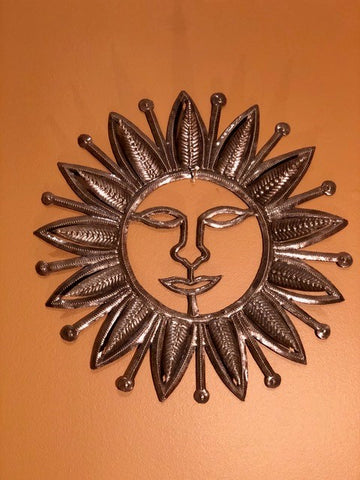 happy sun made in haiti from recycled oil drums