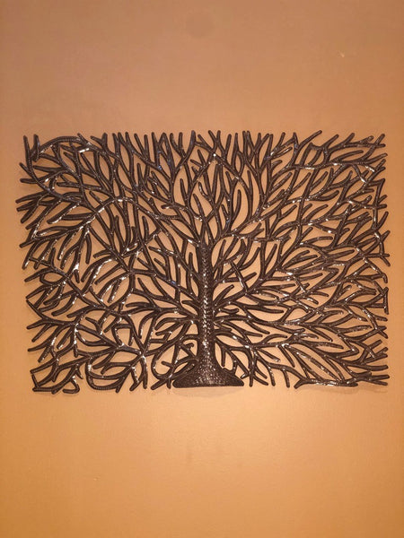 tree of life made in haiti from recycled ironwork
