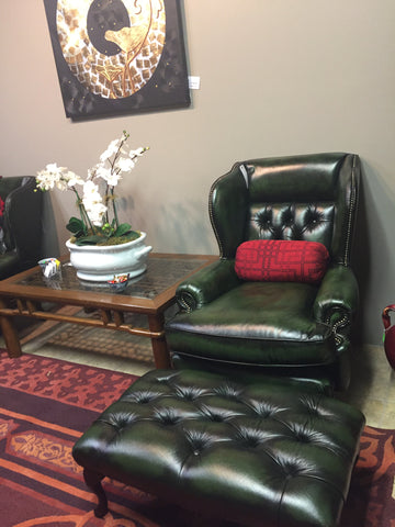 antique green leather wing back chair