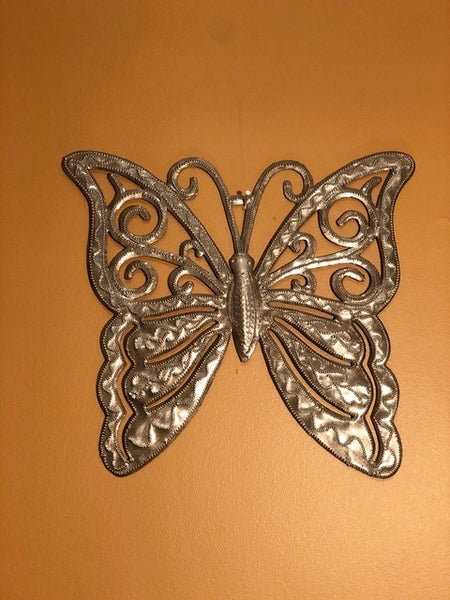 handcrafter butterfly made in haiti from recycled oil drums